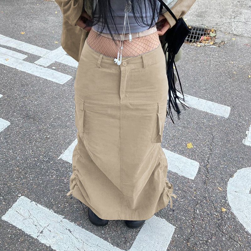 Smocked slit half-length skirt women's 2022 new solid color high waist back slit design over-the-knee woven A-line skirt